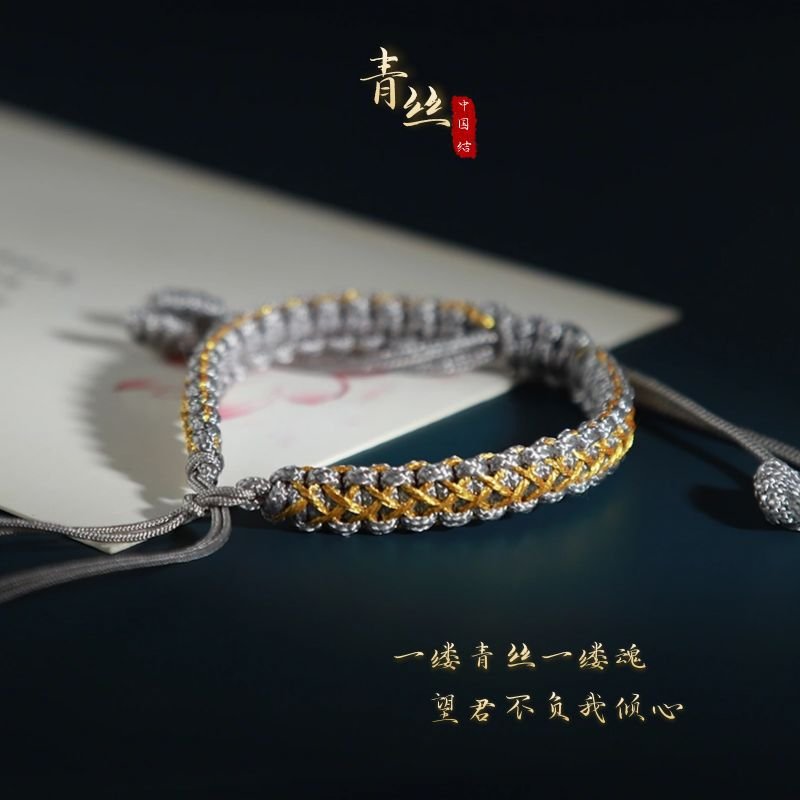 Blue Blazing Bond bangle bracelet with fiery talisman charm.