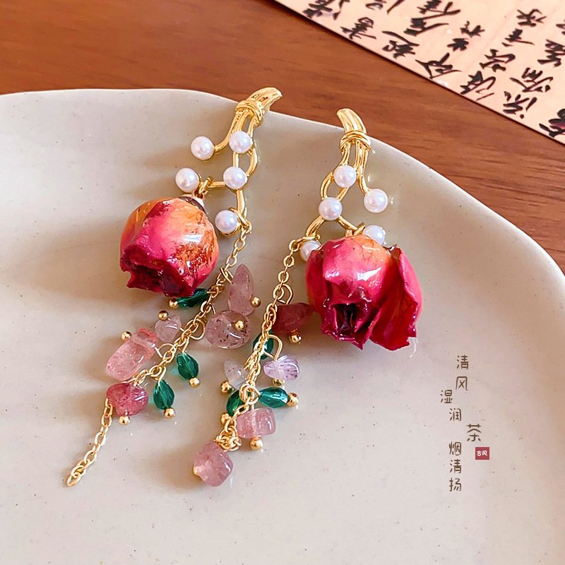 Blazing Ember Talisman earrings with fiery green jade charm.