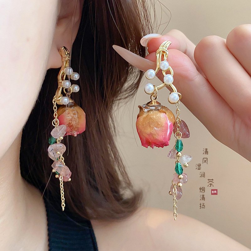 Blazing Ember Talisman Earrings with fiery green jade charm close-up.