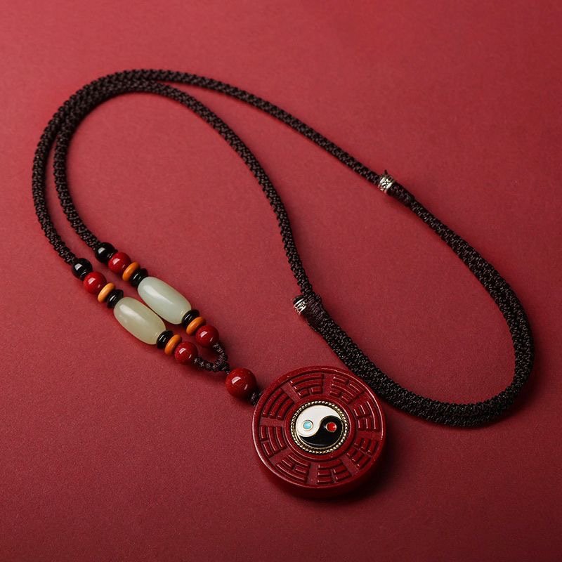 Blue Emberflame Destiny jade pendant, close-up of intricate charm.