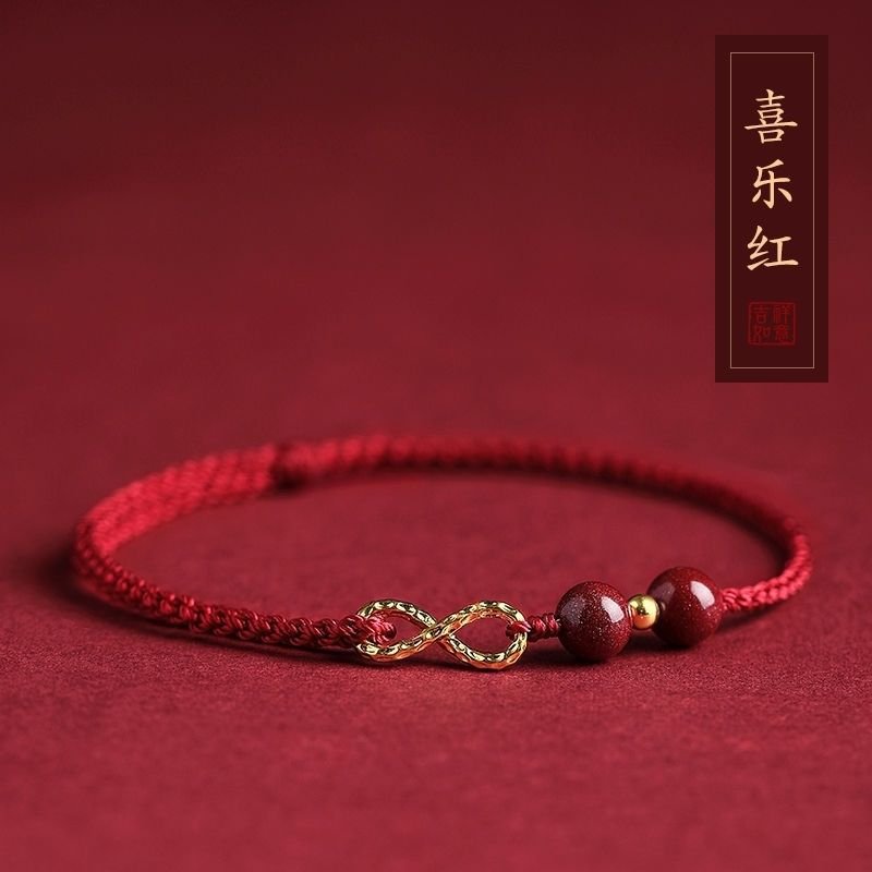 Vermillion Destiny Cord bangle bracelet with charm for luck and protection.