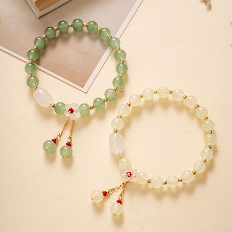 Silverbloom Harmony Bracelet with ancient Chinese charm, gold-tone accents for men.