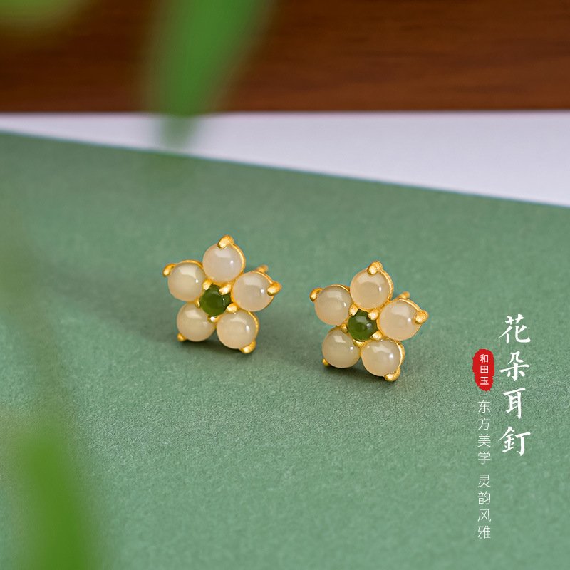 Silver blossom stud jade earrings with peach blossom charm.