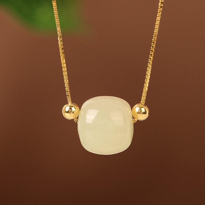 Silver Lunar Radiance Hetian Jade Pendant with artisan craftsmanship.