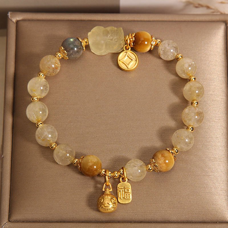 Aurelian Radiance bangle bracelet with metal-forged charm for fortune and harmony.