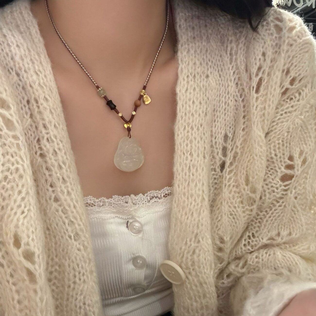 Gold link celestial aura necklace with radiant charm, part of earring and necklace set.