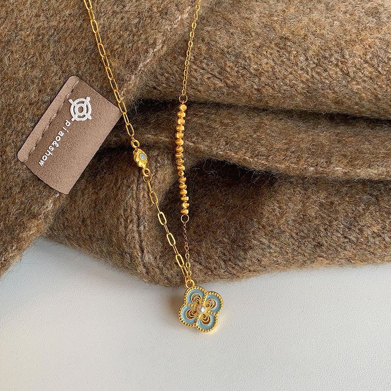 Celestial Radiance gold pendant with intricate design for universal harmony.