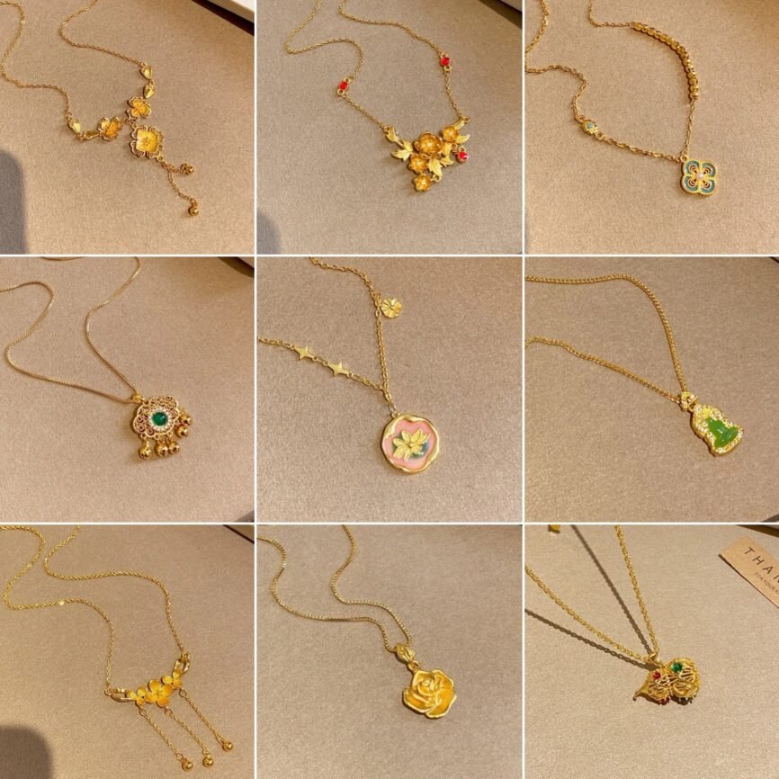 Golden Blossom Alchemy Elixir necklace with blue charm, part of a necklace earring set.
