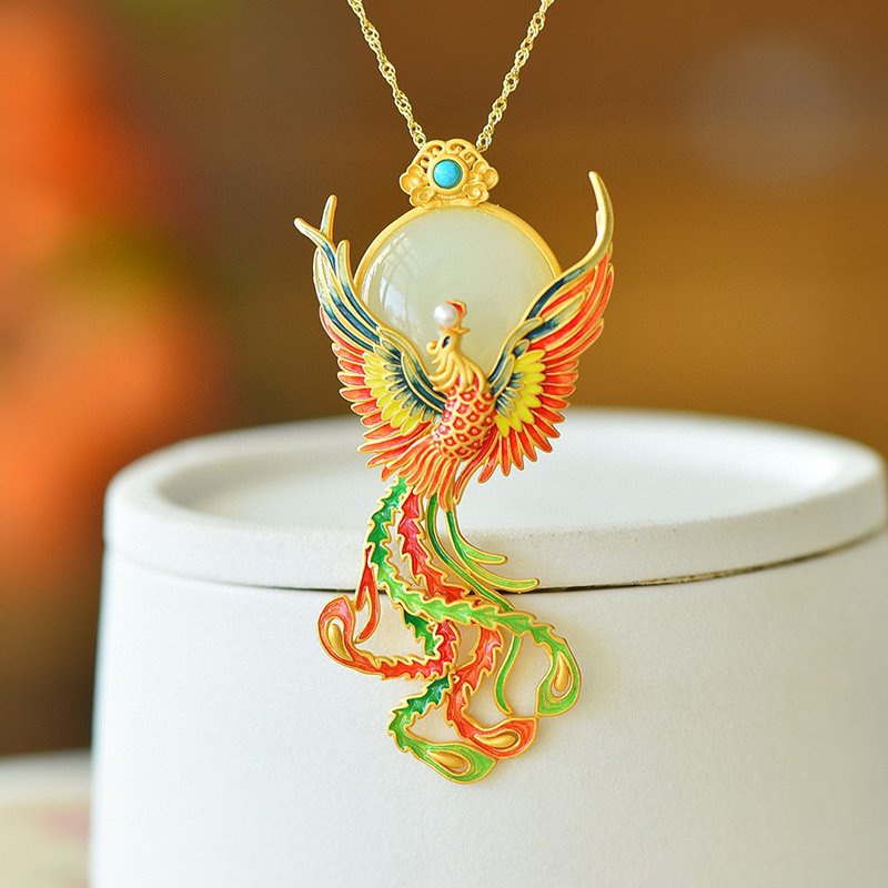 Silver Phoenix pendant with ancient Chinese-inspired design, artisan jewelry.