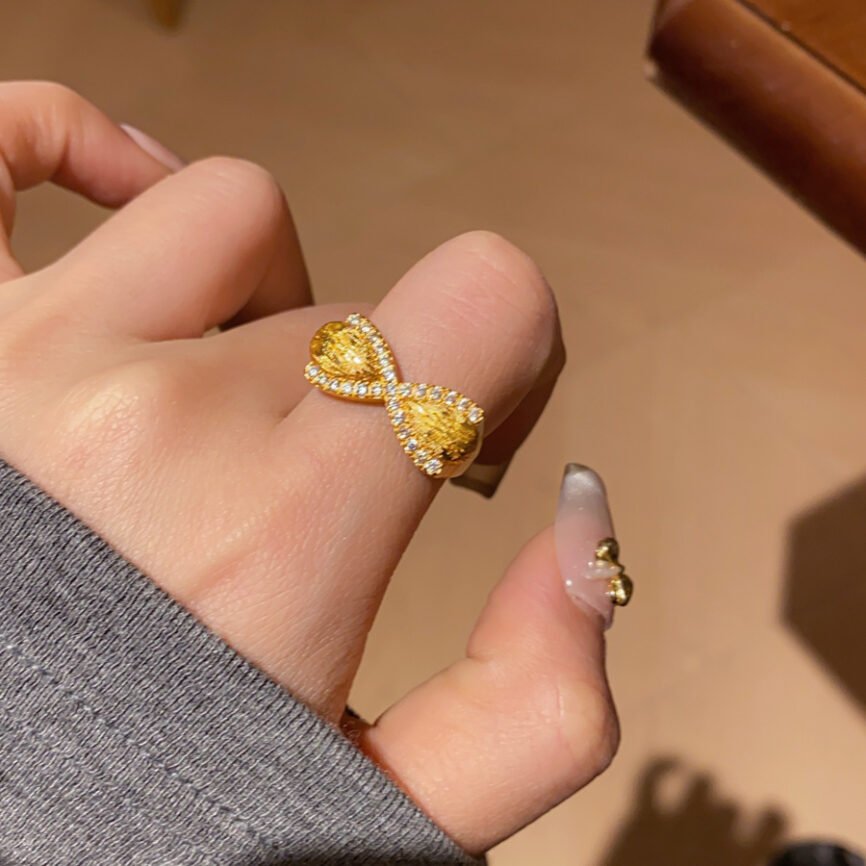 Silverwing Talisman ring pendant with blue charm for harmonious balance.