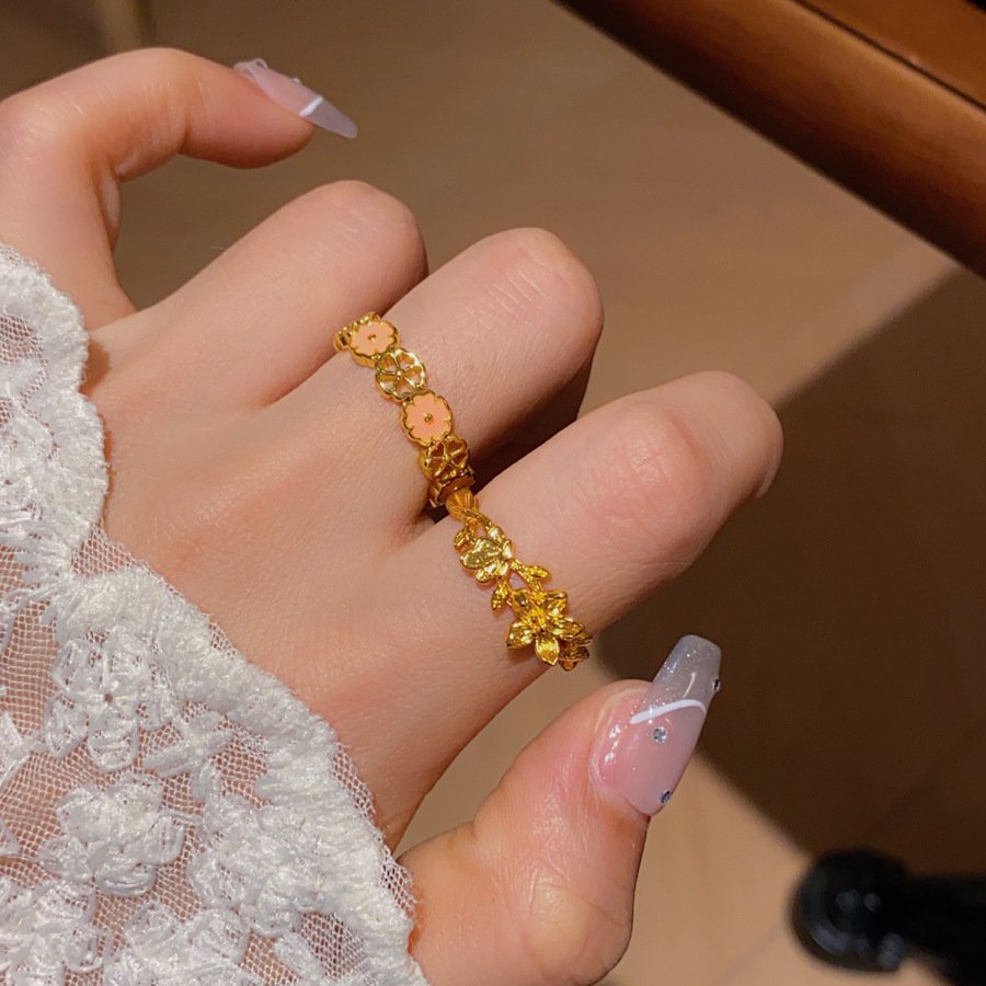 Golden Essence Metal Element Ring with intricate blossom design, symbolizing balance and fortune.