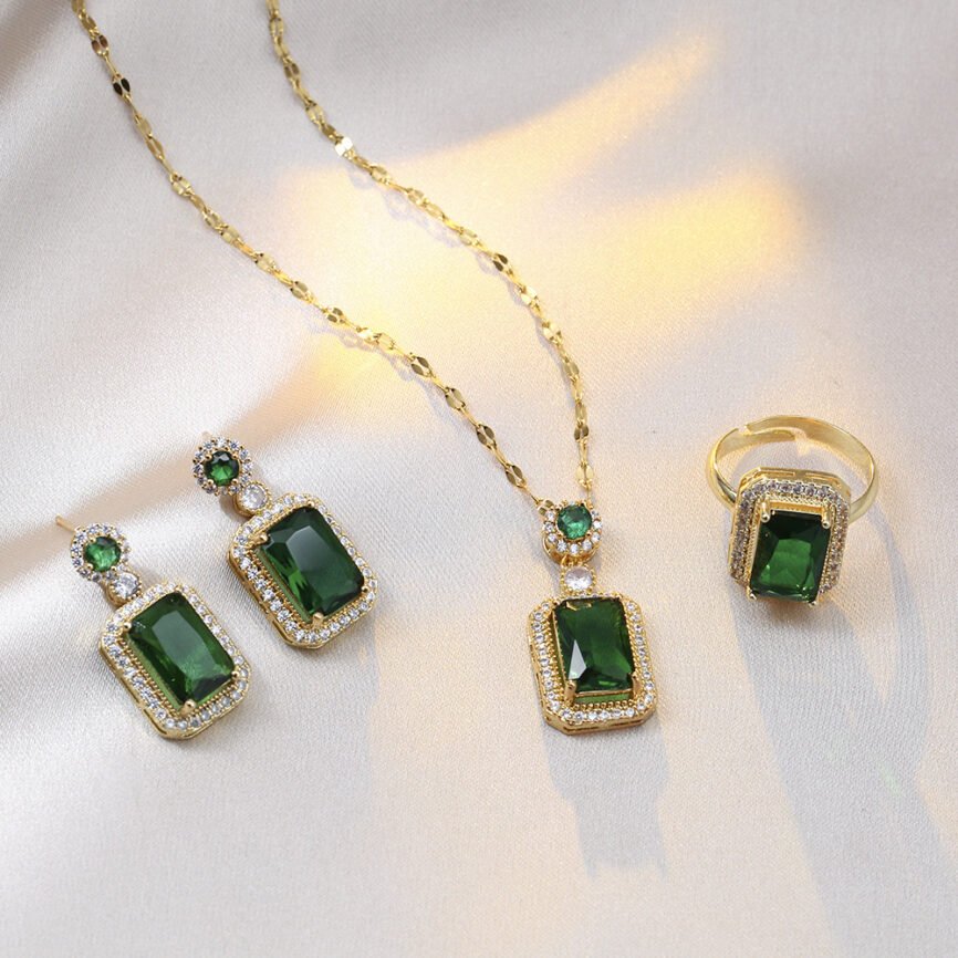 Emerald Essence Harmony pendant with wood charm, blue variant.