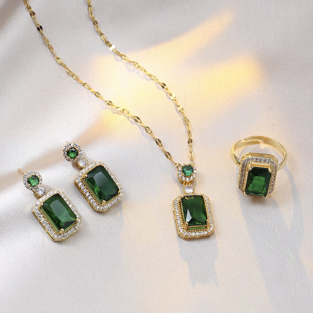 Emerald Essence Harmony pendant with wood charm, blue variant.