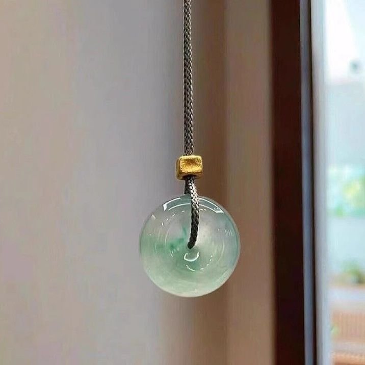 Verdant Harmony Pendant with Ancient Chinese wood energy charm.