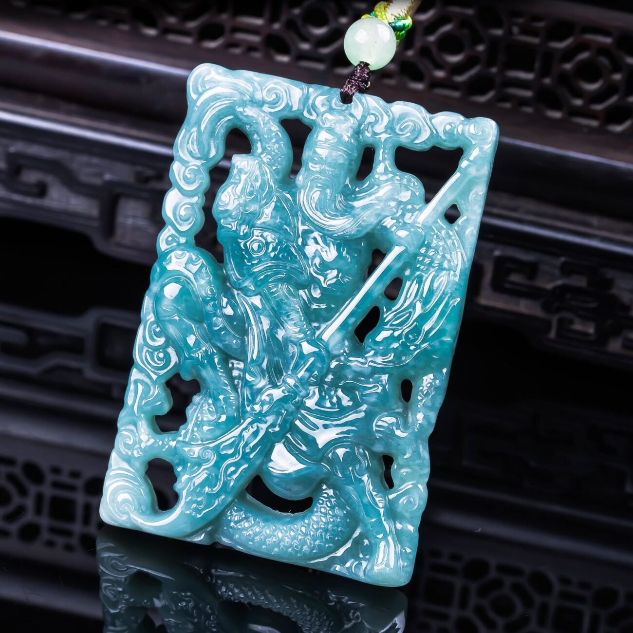 Verdant dragon pendant jewelry, artisan-crafted with intricate Chinese dragon detailing.