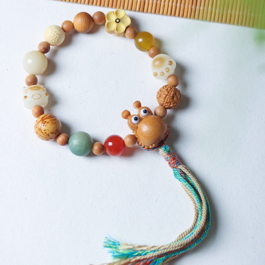 Blue Celestial Harmony Moonlit Bodhi bangle bracelet with charm, balancing elements.