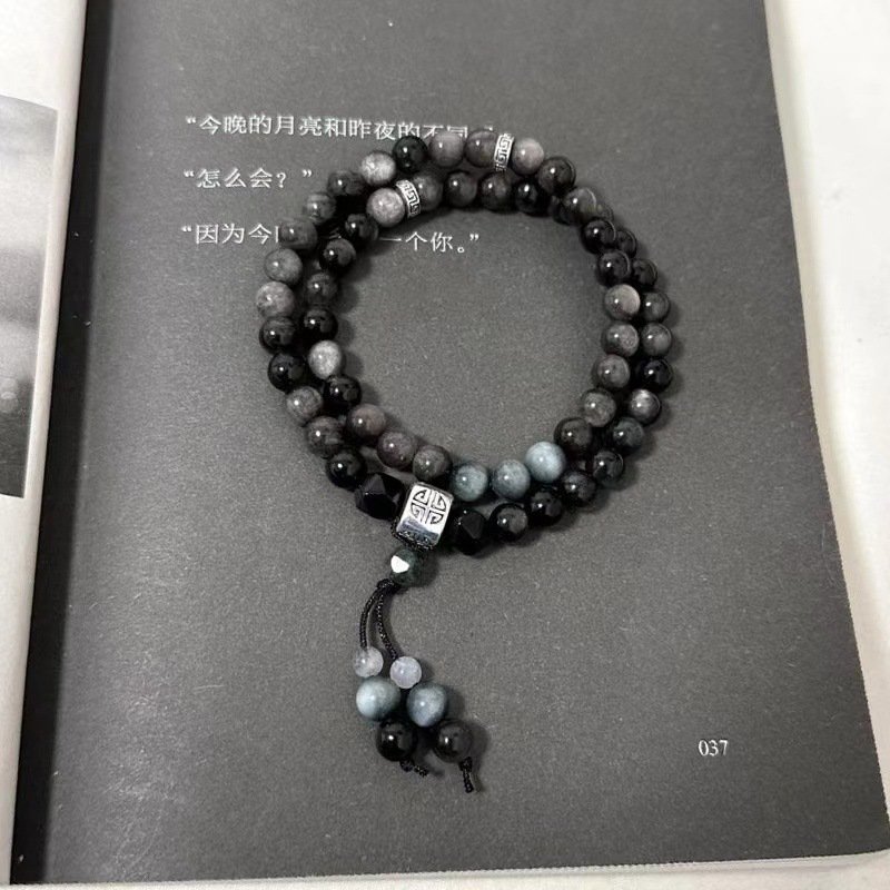 Blue Eternal Flow Bodhi Twin Loop bangle bracelet with charm, balances energy.