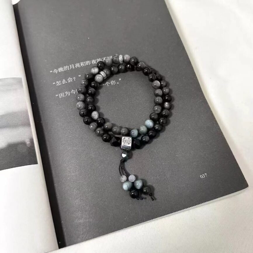 Blue Eternal Flow Bodhi Twin Loop bangle bracelet with charm, balances energy.