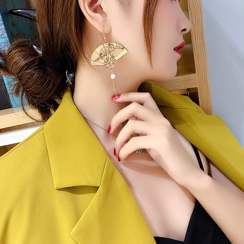 Blue jade drop earrings with luminous fan dance charm, inspired by ancient Chinese elegance.