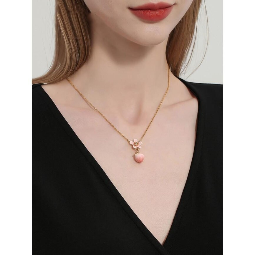 Blossom Mystique Necklace with peach blossom charm, artisan jewelry.