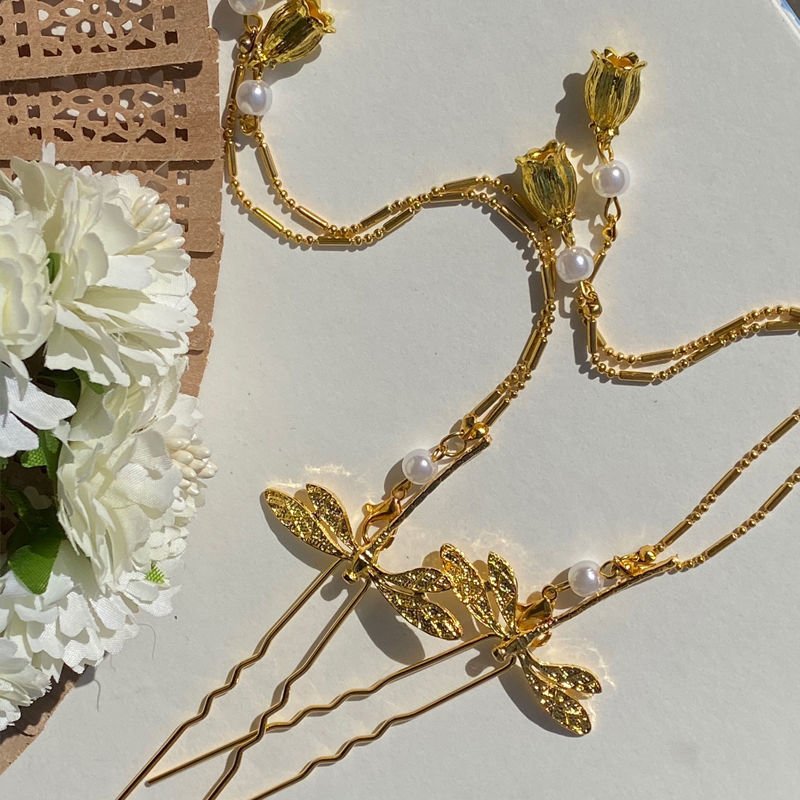 Blue Ethereal Plume Cloudpin hairpin with delicate wind-inspired charm.