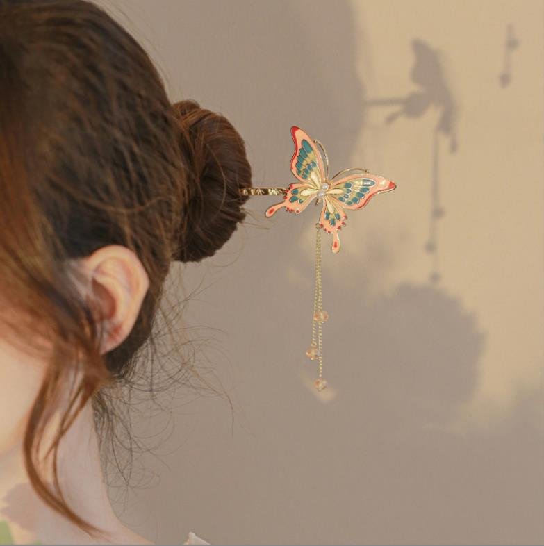 Blue celestial hairpin with ethereal cloud charm, subtle hairpin curve.