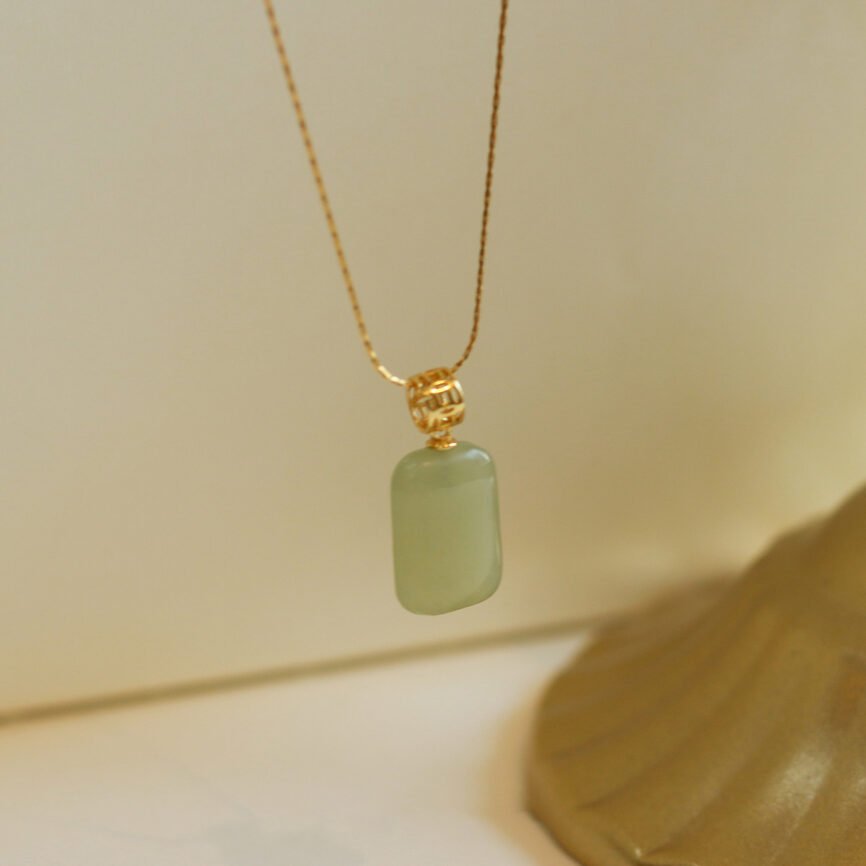 Eternal Balance jade pendant necklace close-up, harmonizing energy charm.