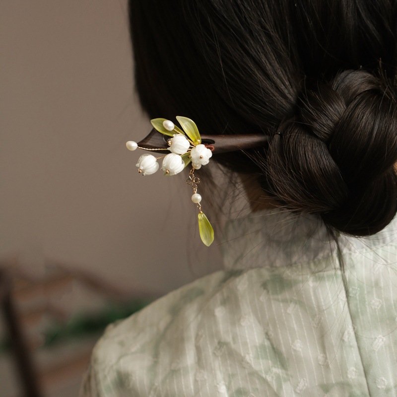Blue Ethereal Orchid Moon hairpin with cosmic charm details.