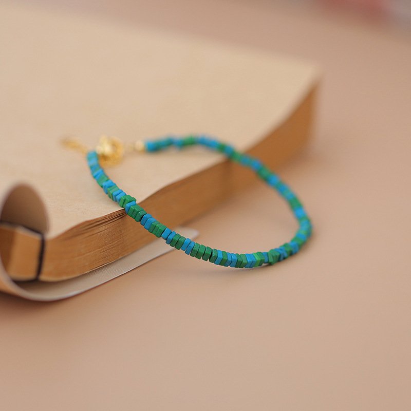Blue Pine Breeze Essence bangle bracelet with nature-inspired charm.