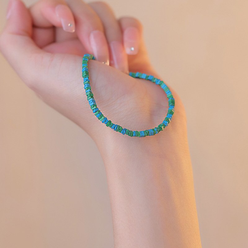 Blue Pine Breeze Essence bangle bracelet with nature-inspired charm.