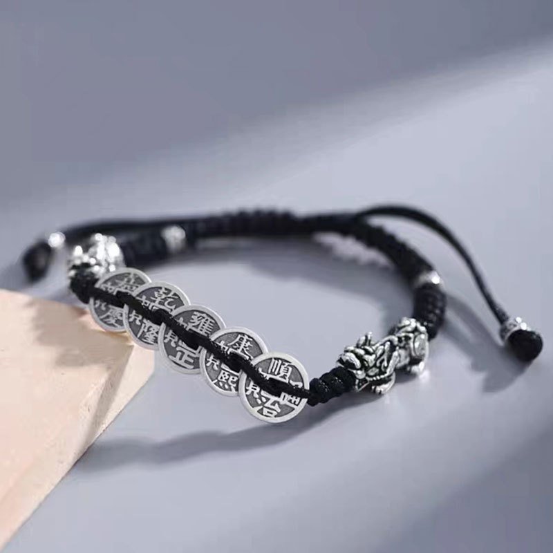 Blue Mystic Xuan Wealth-Bind bracelet with gold Pandora charm, artisan jewelry for prosperity.