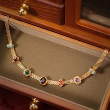 Blue celestial radiance chunky gold chain necklace with lunar prism charm.