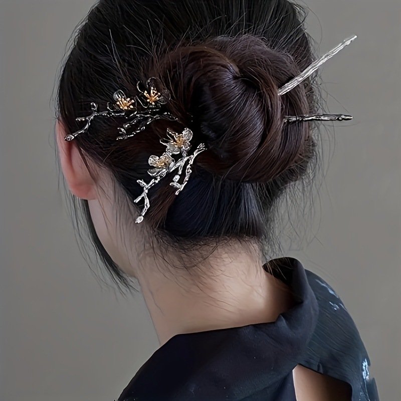 Mystic peach moonlit hairpin with celestial charm, close-up view.