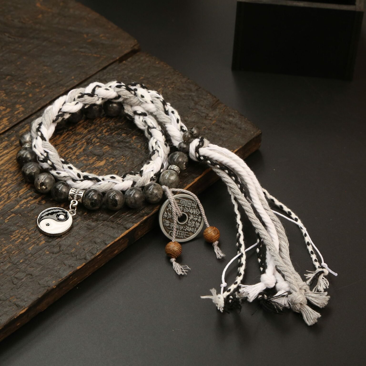 Blue Mystic Harmony charm bangle bracelet with intricate ancient Chinese symbols.