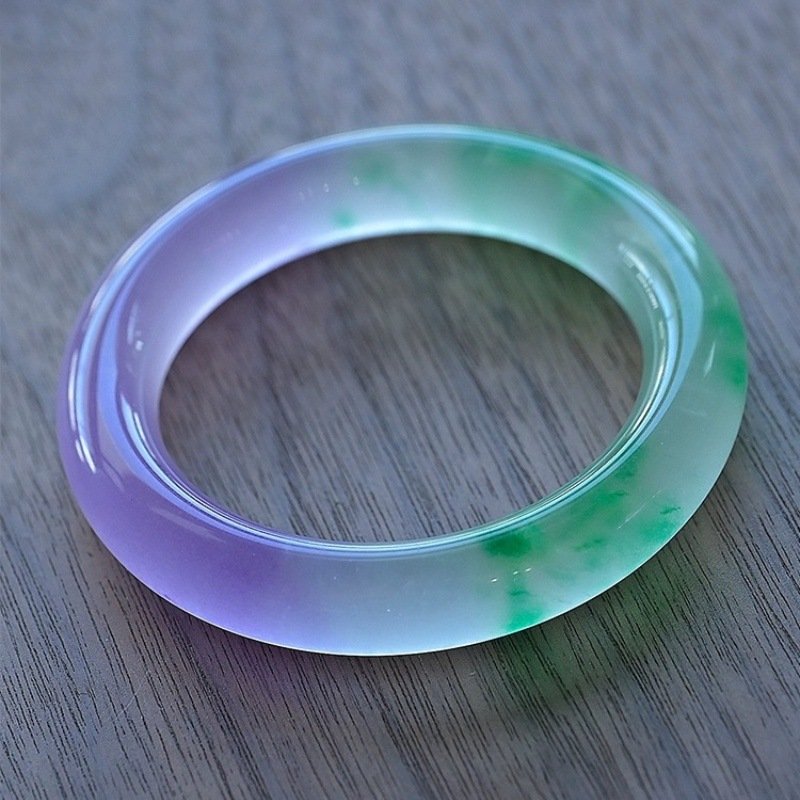 Museum-quality Hetian jade carving showing the lustrous finish characteristic of fine nephrite jade
