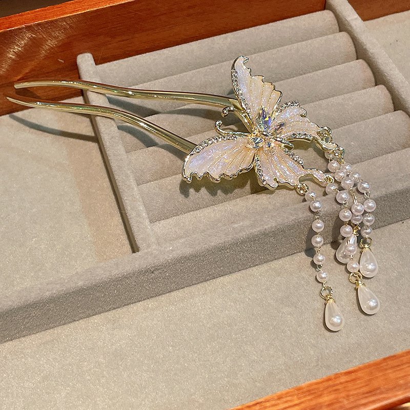 Blue Ethereal Butterfly Cloud Hairpin by Fiona Franchimon, close-up charm detail.