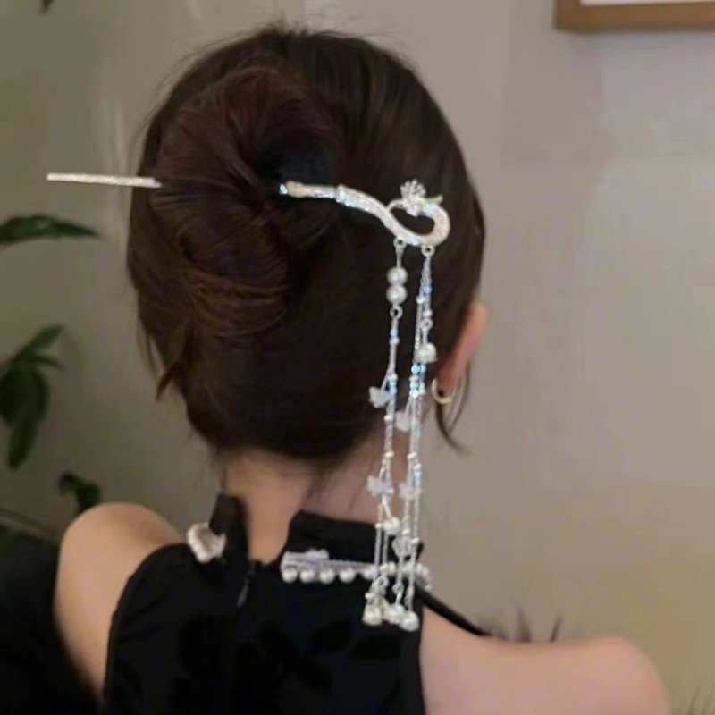 Blue Phoenix Ascendant Cloudpin hairpin with celestial design.