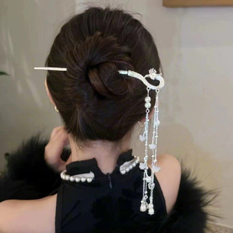Blue Phoenix Ascendant Cloudpin hairpin with celestial charm detail.