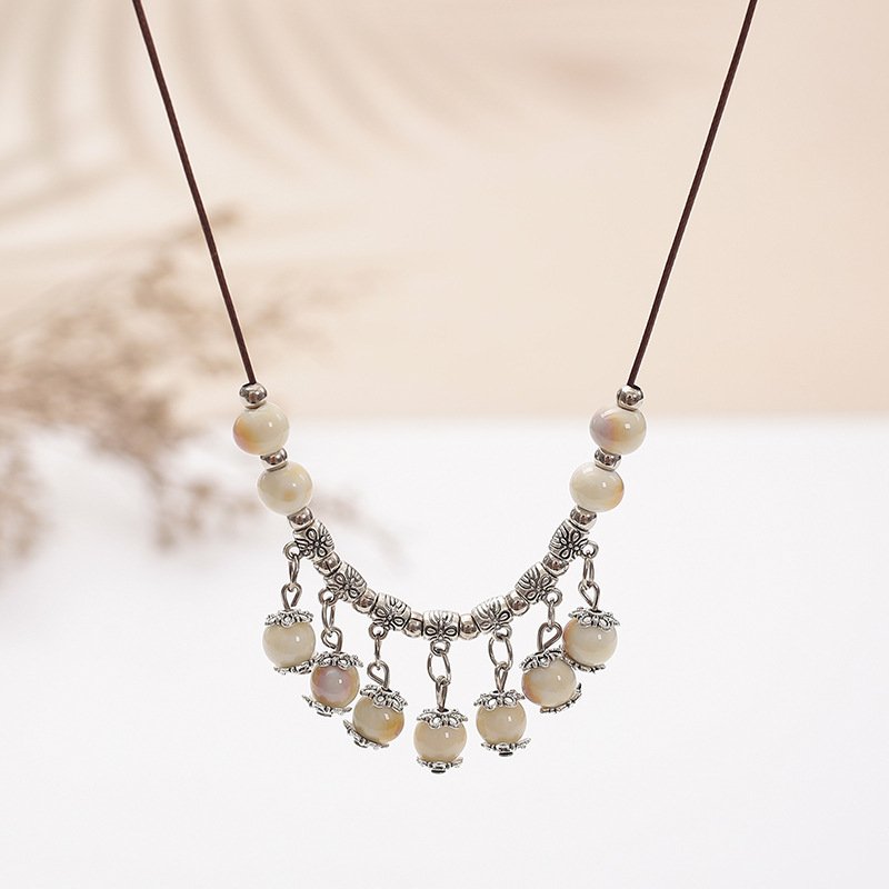Blue celestial cloud harmony pendant with serene design.