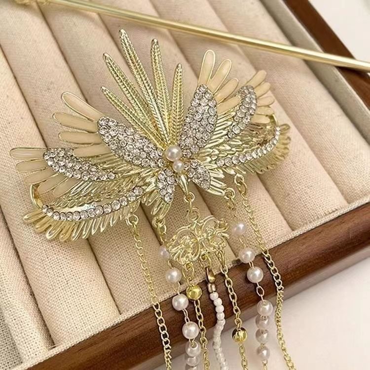 Blue Ethereal Ascension cloud hairpin with flowing, graceful design.