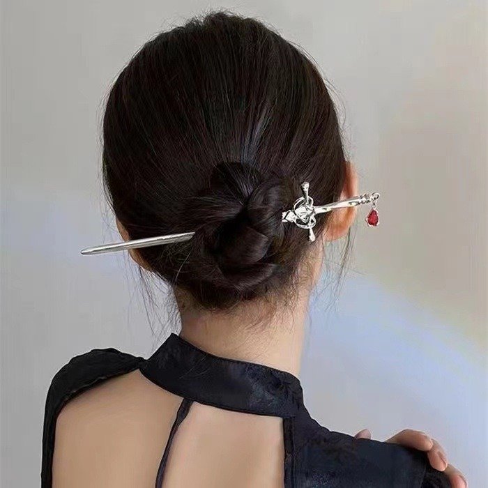 Blue Celestial Phoenix Grace hairpin with elegant charm detail.