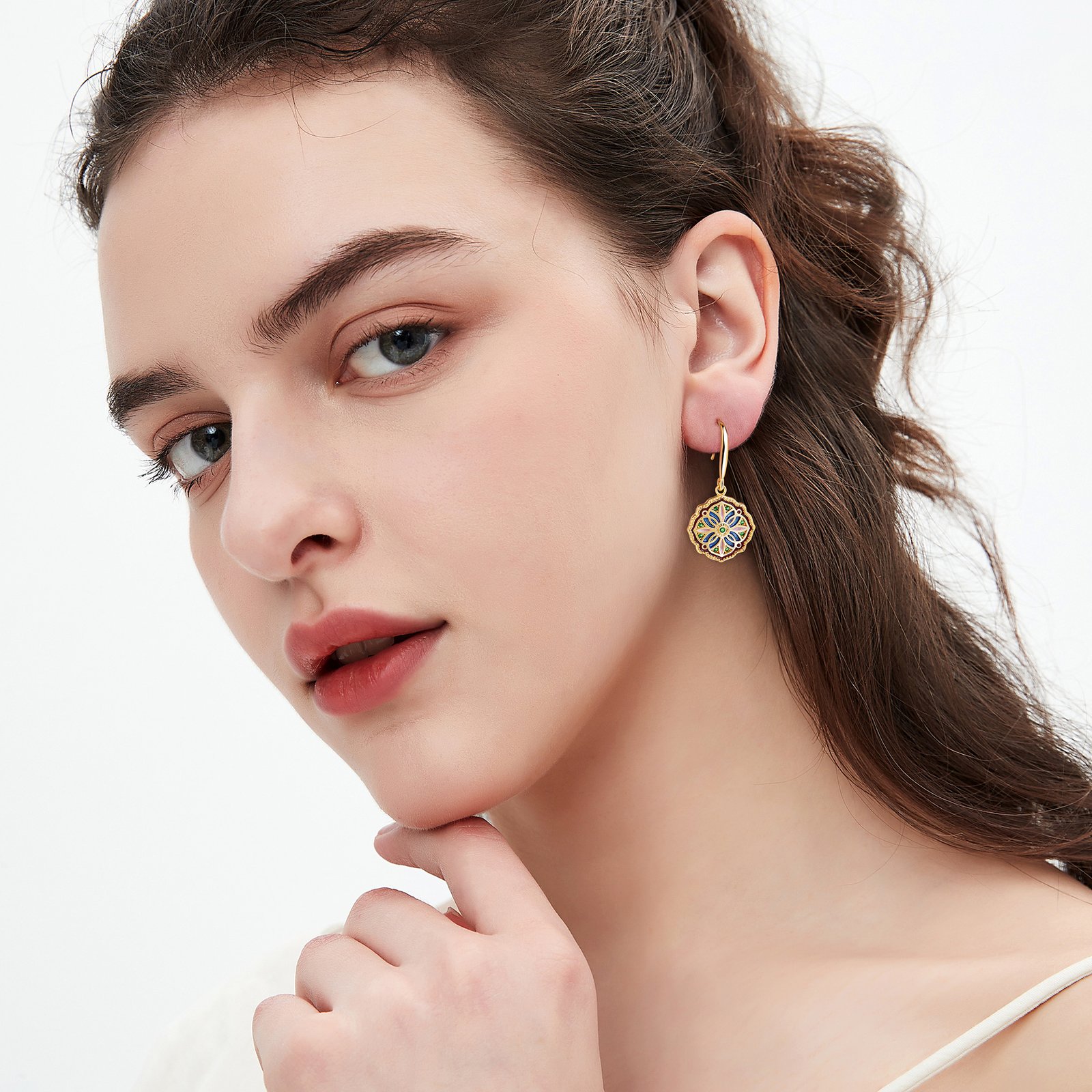 Blue Mystic Pearl Moonlit Duo earrings with gold accents and jade charms.
