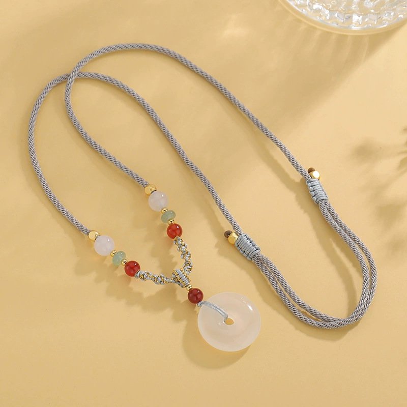 Blue Ethereal Cloud Talisman jade pendant with celestial charm.