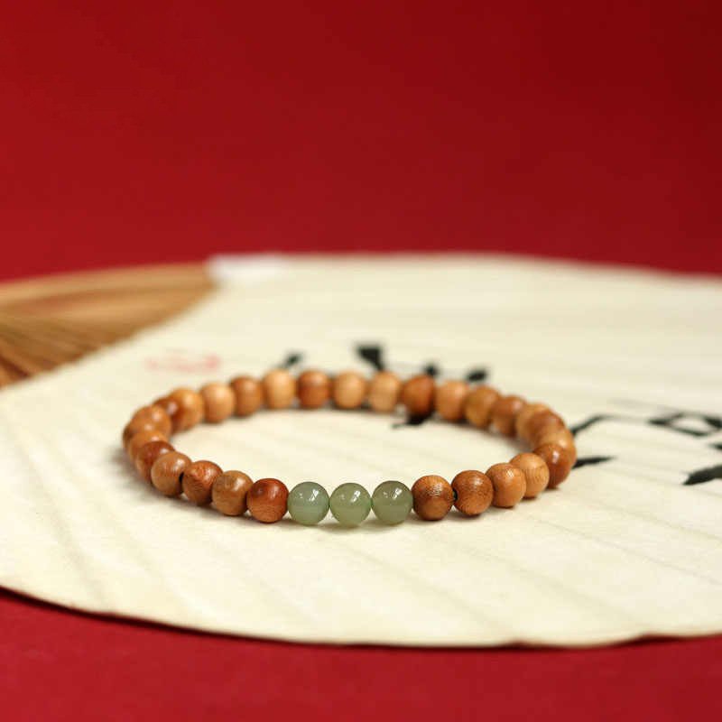 Harmony Cloud Jade & Peachwood bangle bracelet for wealth and blessings.