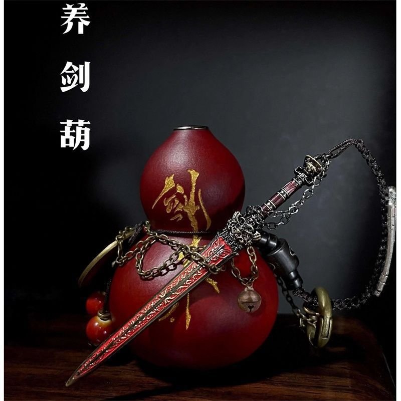 Celestial Verdant Sword Gourd artisan jewelry pendant with intricate cosmic design.
